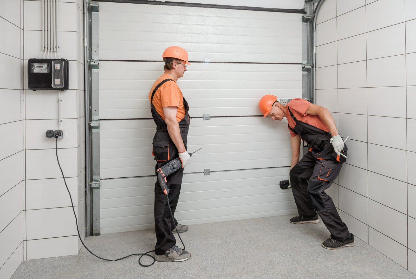 The Worker Is installing Lift Gates